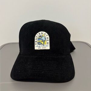 TravisMathew Black Cap with Multicolor Patch